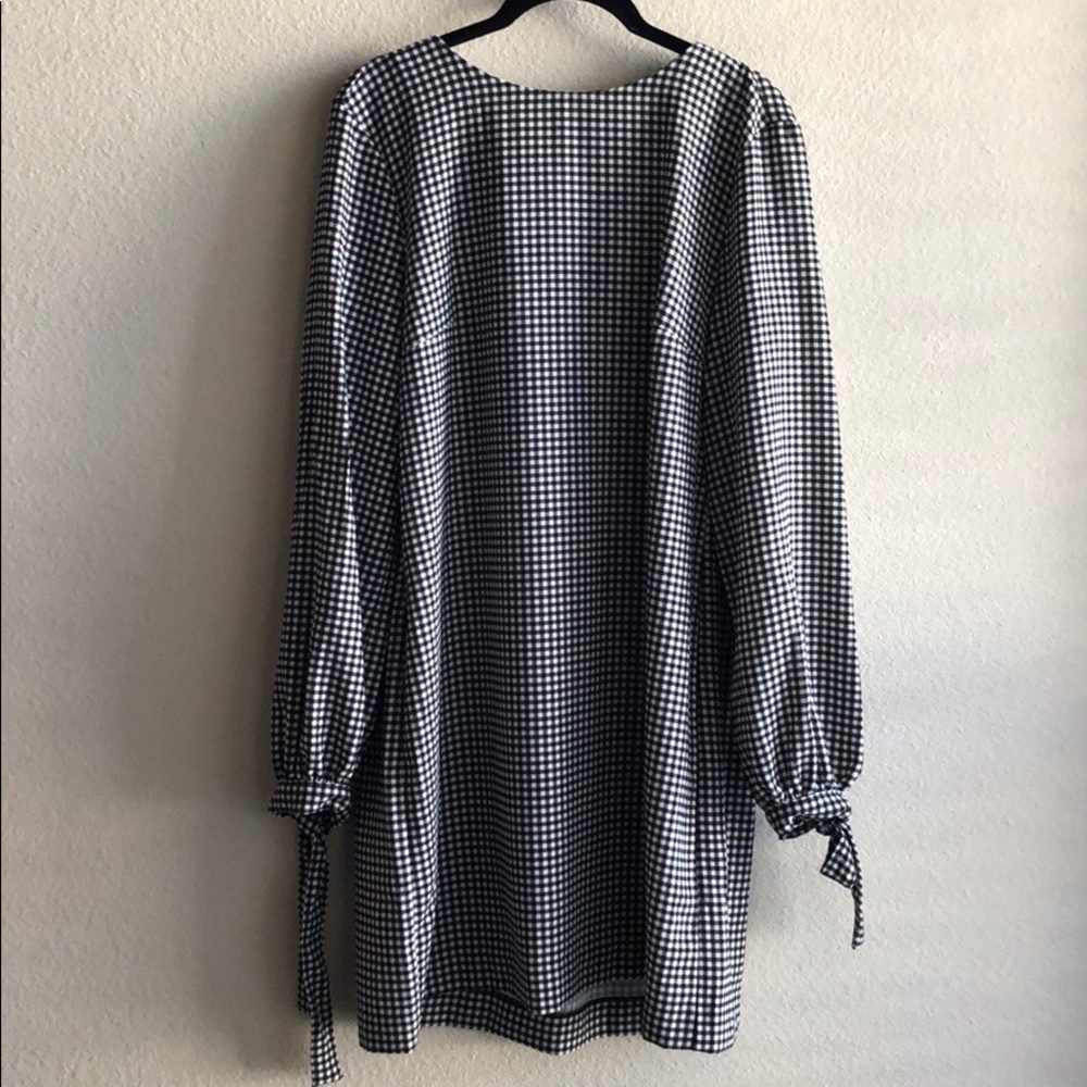 Black and white long sleeved gingham shift dress.